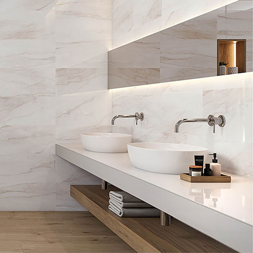 Carrara Gold Marble Effect Tiles used as bathroom wall tiles in a traditional large bathroom