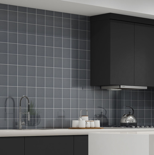 Johnsons Prismatics Square Gloss Hawk Grey Tiles used in a modern kitchen with dark cupboards