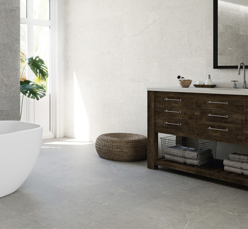 Grespania Niza Gris Stone Effect Floor Tiles used as neutrally themed modern bathroom floors in a naturally lit bathroom.