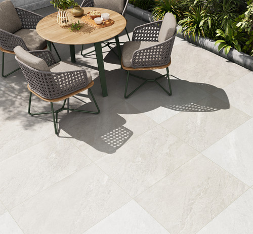 Colorado White Stone Effect Outdoor Tiles used on an outdoor patio with outdoor furniture