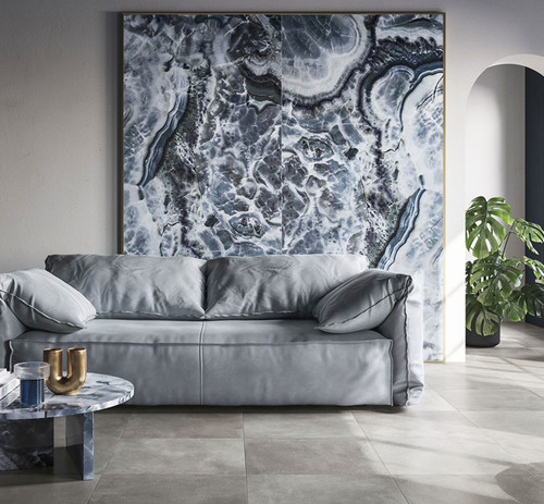 Preziosi Ocean Polished Colourful Marble Effect Tile used as a bluer feature wall tile in a living room