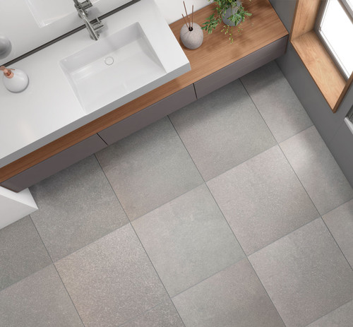 New York Grey Porcelain cement effect Floor Tiles used in a small modern bathroom