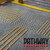 Genesis FTCA Pathway Shanked Stainless Steel Corduroy Tactile in yellow used on a concrete floor