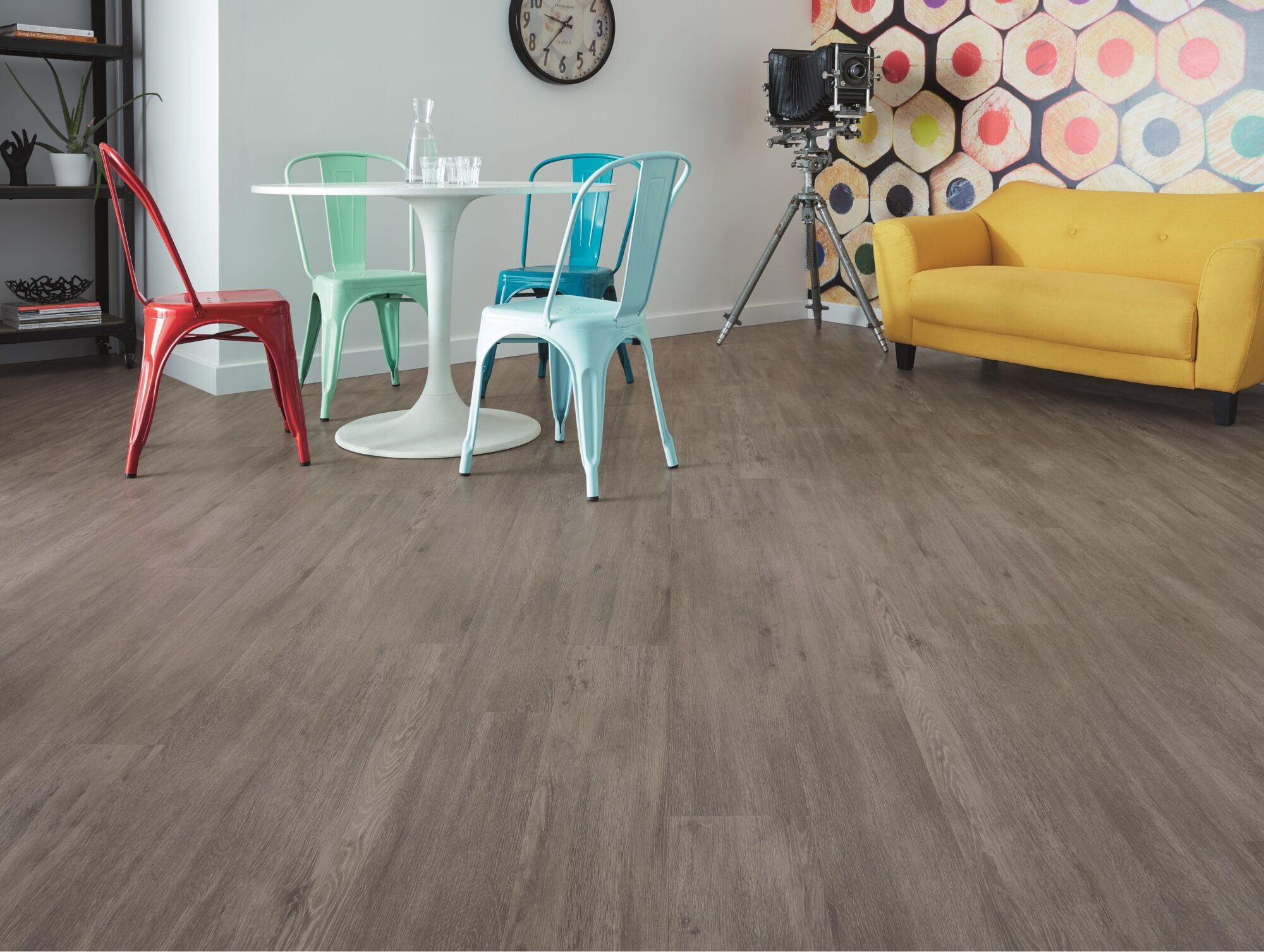 Palio by Karndean Looselay Linosa LLP148 vinyl flooring used in a front room with brightly coloured chairs