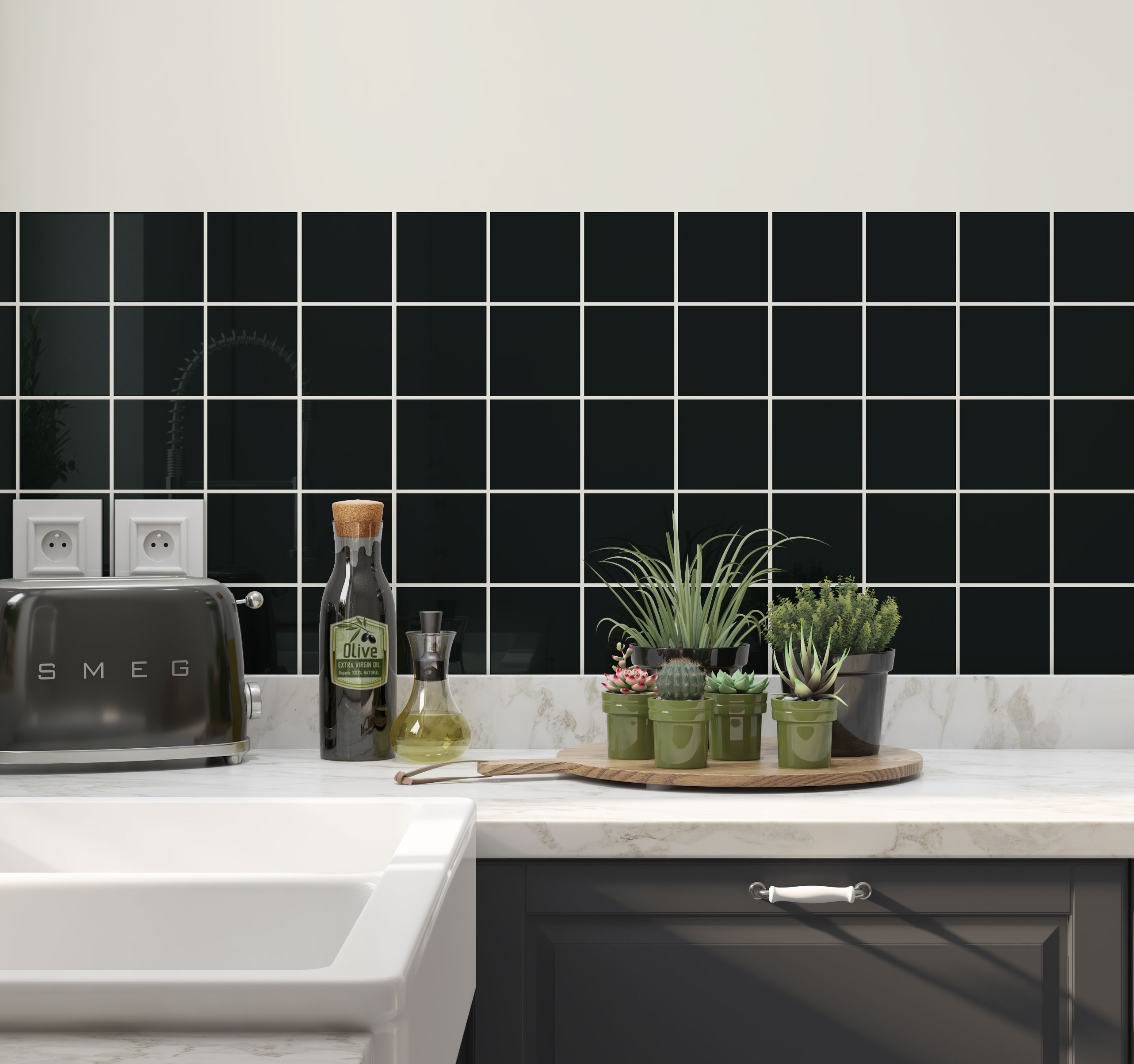 Johnsons Prismatics Square Gloss Black Tiles used in a  modern kitchen with white work tops and potted plants.