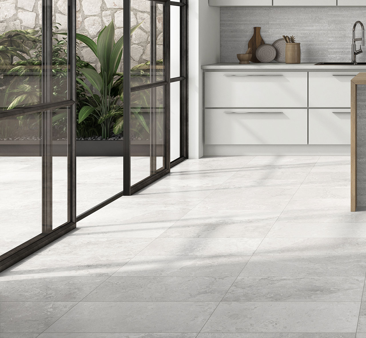Tranquil Tone Silver Stone Effect Floor Tiles used in a naturally lit modern kitchen