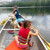 Kids enjoying a canoe paddle