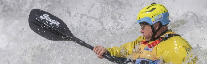 Brad Burden freestyle kayaking with a Sawyer paddle