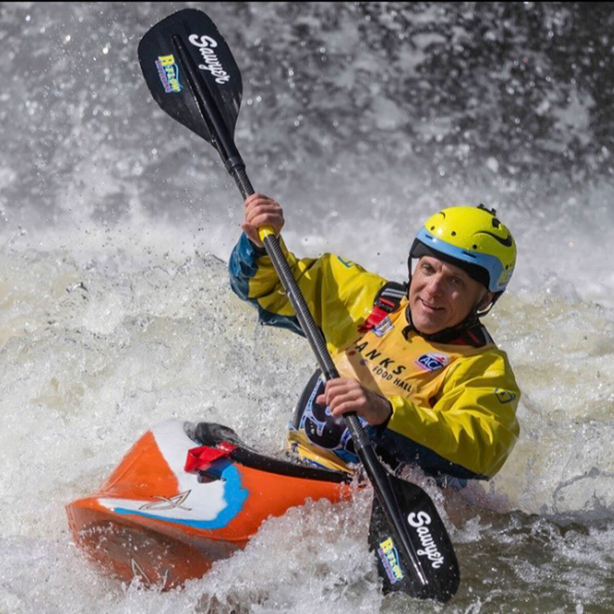 Brad Burden on whitewater with Sawyer kayak paddle