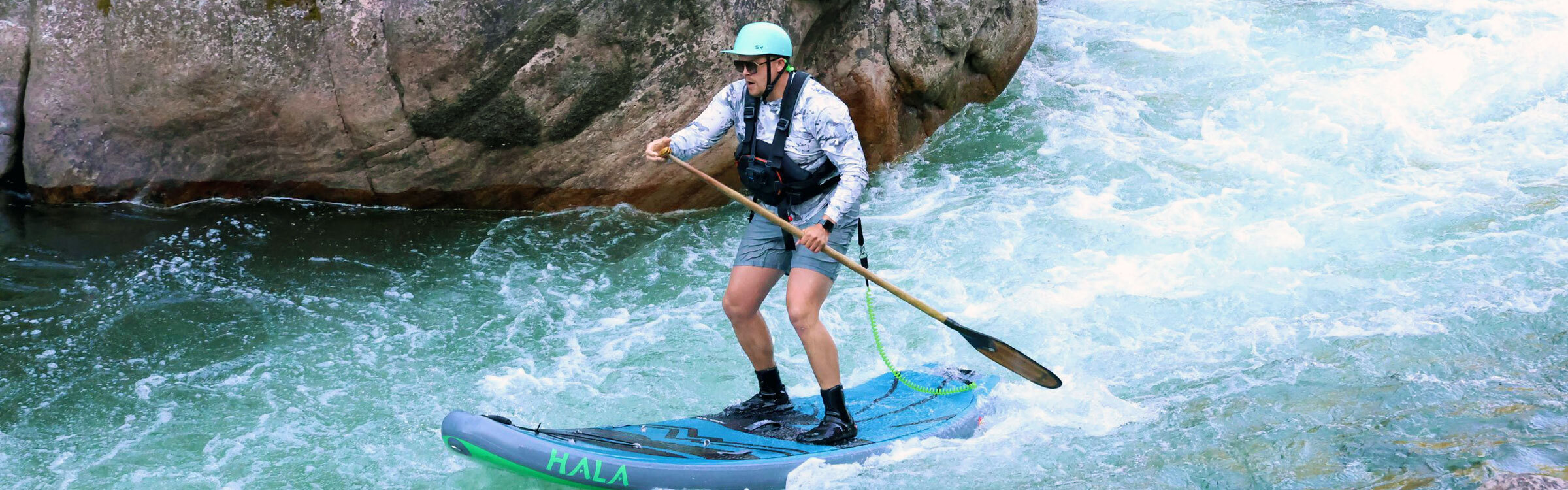 Chad Dokken whitewater stand-up paddling in Montana