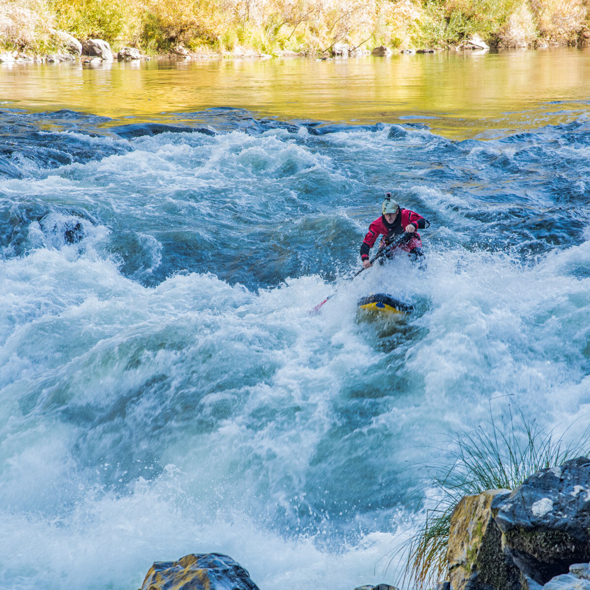 Covey Baack Running Rannie Falls on a SUP