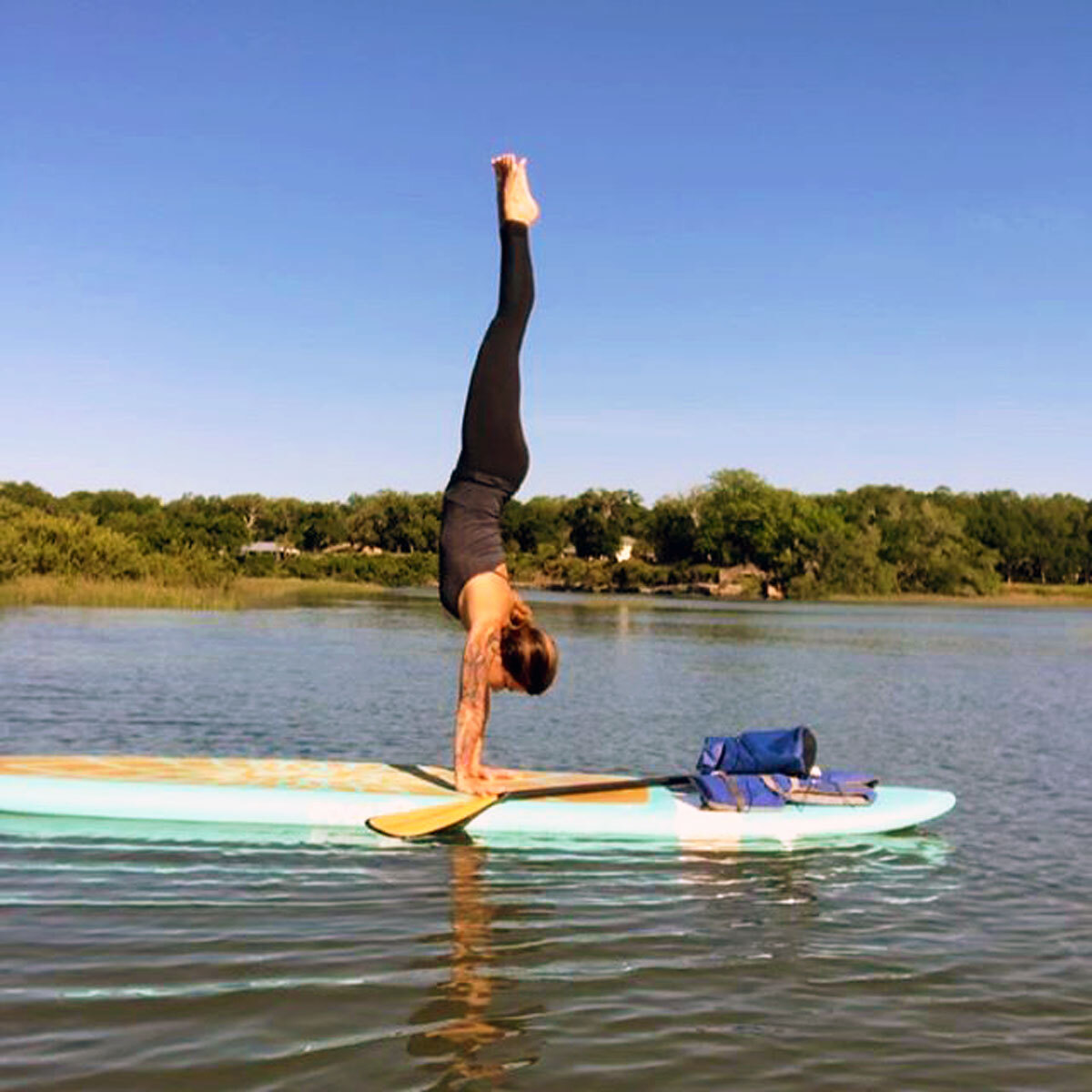 Jessica Amendola with Sawyer SUP paddle