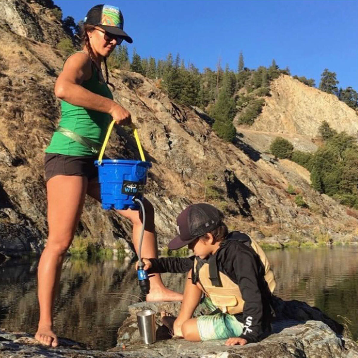 Kelly Wiglesworth filtering river water