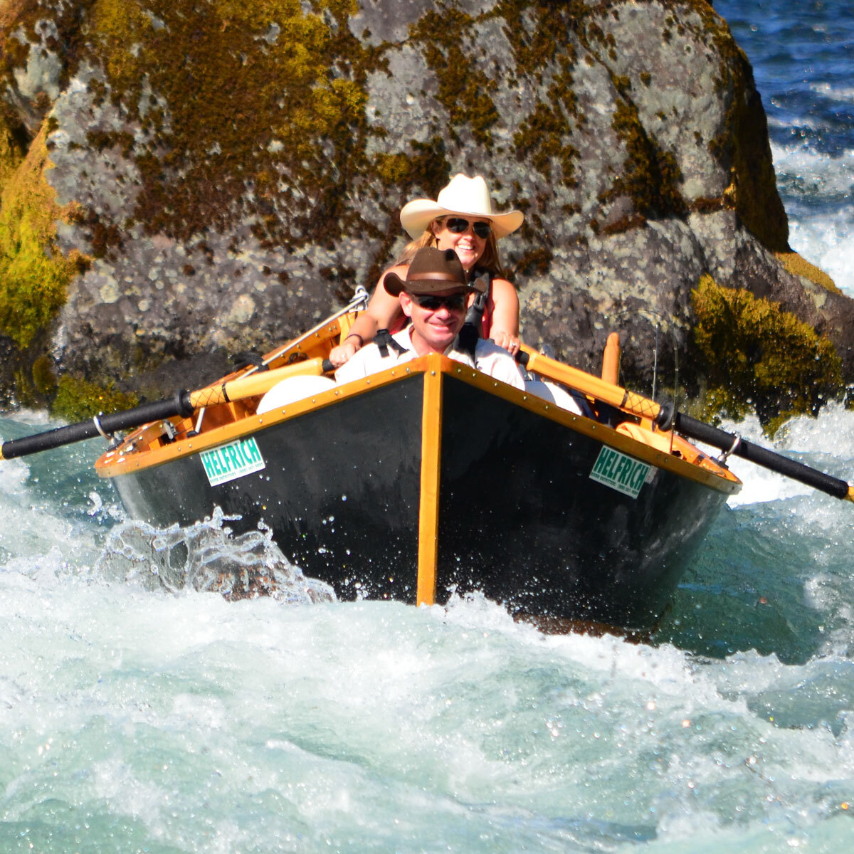 Kelsey Helfrich rowing a drift boat on the McKenzie River