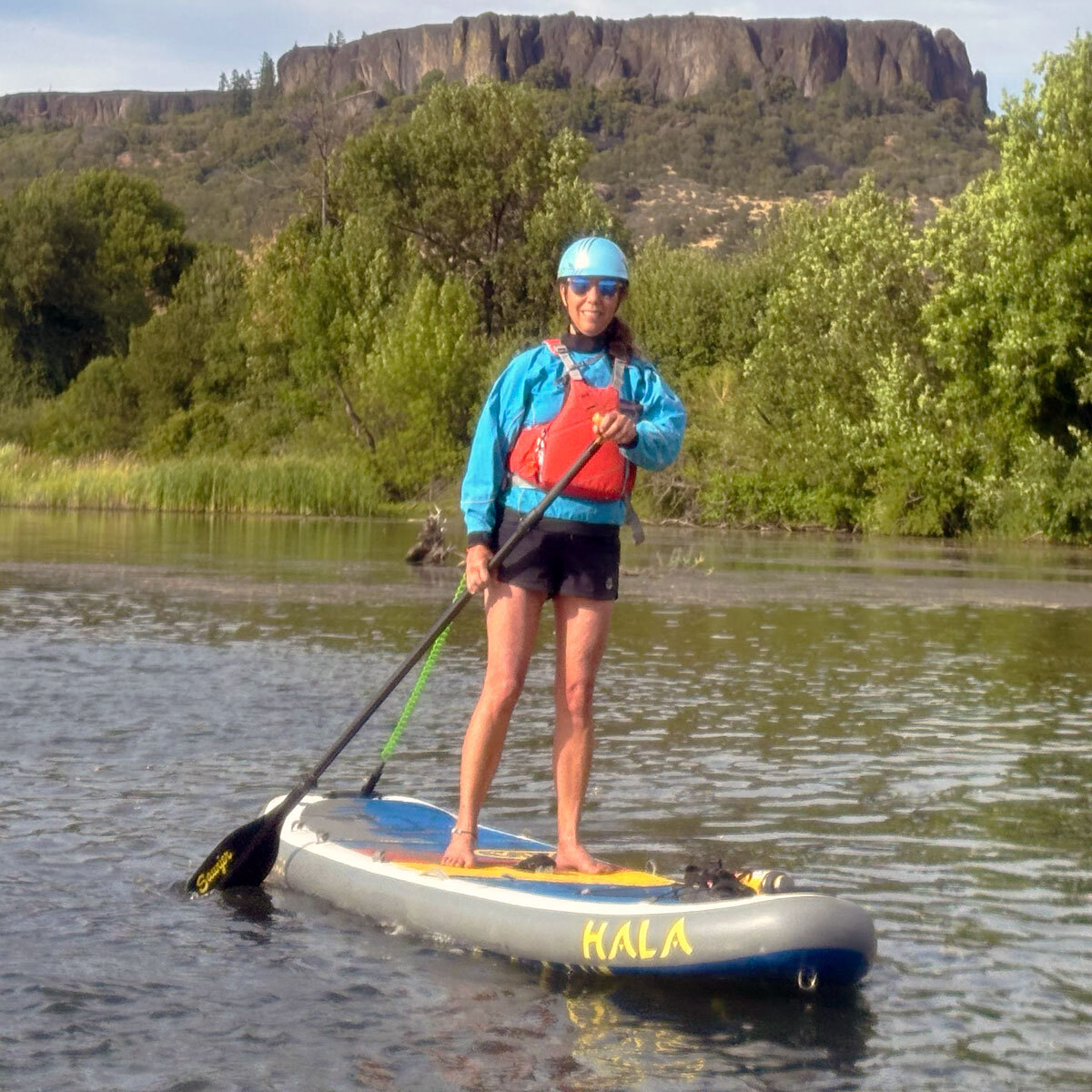 Sawyer paddles and oars at a river event
