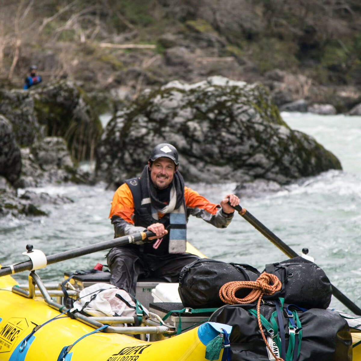 Zach Collier rowing whitewater in Oregon