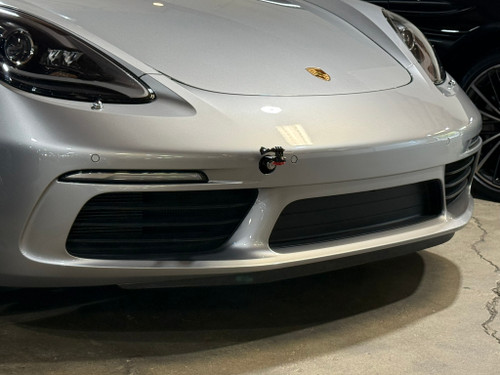 Action Cam Bumper Mount shown on a 2022 Porsche 718 Cayman T. Installing the Action Cam on the rear of the 718 Cayman/Boxster requires the rear license plate to be removed and is not recommended for daily driving.  