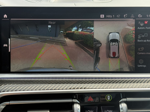The Action Cam Bumper Mount should not interfere with the parking/proximity sensors or block the rear-view camera. 