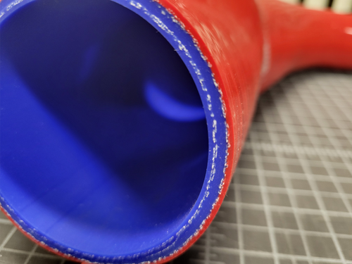 Samco hose zoom of silicone layers and cloth fiber reenforcement