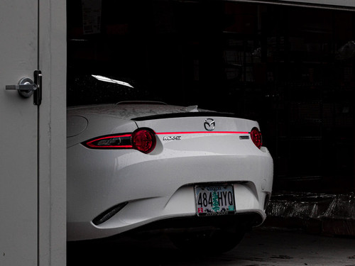 The MX5Things rear led running light installed on a white 2016 ND Miata