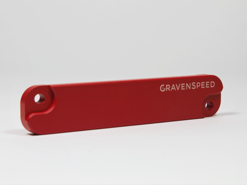 The CravenSpeed Battery Tie Down in red, installed in a 2016 ND Mazda MX-5 Miata.