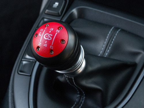 Swappable Shift Knob Cap Installed on a Toyota GR86, red