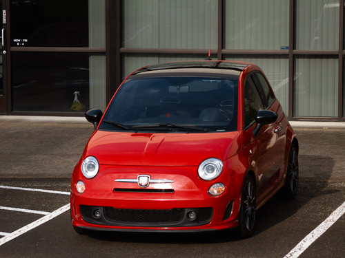 A Fiat 500 Abarth with the CravenSpeed roof trim protector installed.