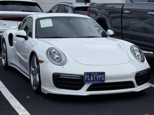 The Platypus License Plate Mount shown on a 2018 991.2 Porsche 911 Turbo. Compatible with all 991 gen 911s, with the exception of the 991.2 GT3 / GT3 RS. 