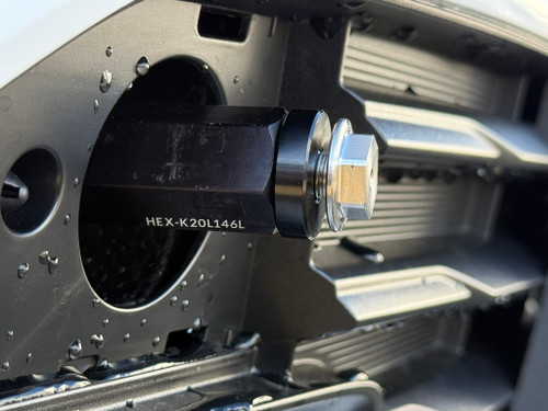 Install the .25in spacer as shown. The spacer provides a bit of extra clearance to keep the plate frame from making contact with the bumper. 