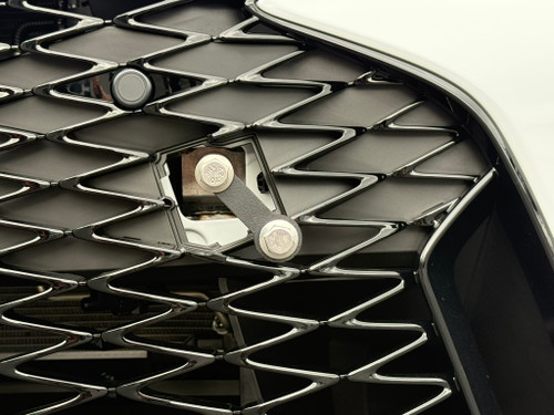 Position the inlcuded extension arm as shown. Using the extension arm will keep the plate frame from setting off the parking/proximity sensors. 
