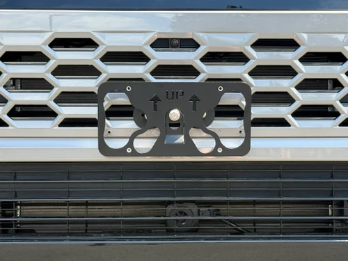 NOTE: Installation on the lower grille (black grille area) is not recommended due to stability issues. 