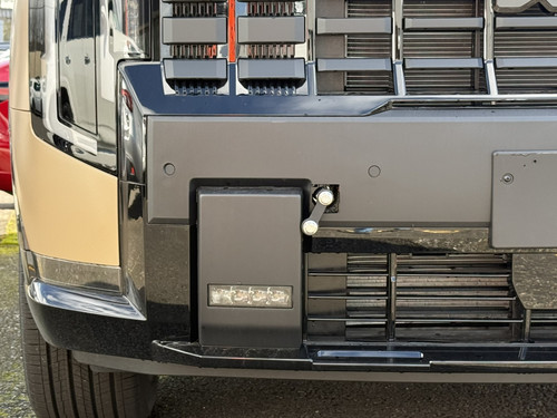 IMPORTANT: Position the extension arm as shown in the photo for X-Line trim models