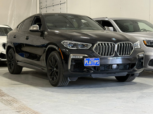 The Platypus License Plate Mount shown on a 2020 BMW X6 M50i (pre-facelift). This kit is designed for model years 2020 to 2023 only. Please see our other listing if you own a 2024+ BMW X6. 