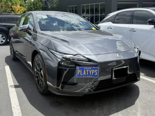 The Platypus License Plate Mount shown on a 2026 Lexus ES 500e AWD