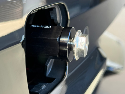 Install the .25in aluminum spacer as shown. The spacer will provide a bit of extra clearance for the license plate frame, and keep it from making contact with the bumper.
