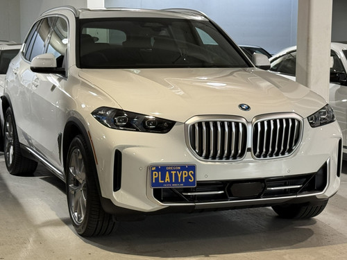 The Platypus License Plate Mount shown on a 2025 BMW X5 xDrive50e. Compatible with 2024+ Models with the M Sport appearance package. 