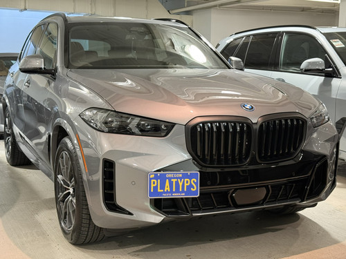The Platypus License Plate Mount shown on a 2024+ BMW X5 xDrive with optional M Sport appearance package. 
