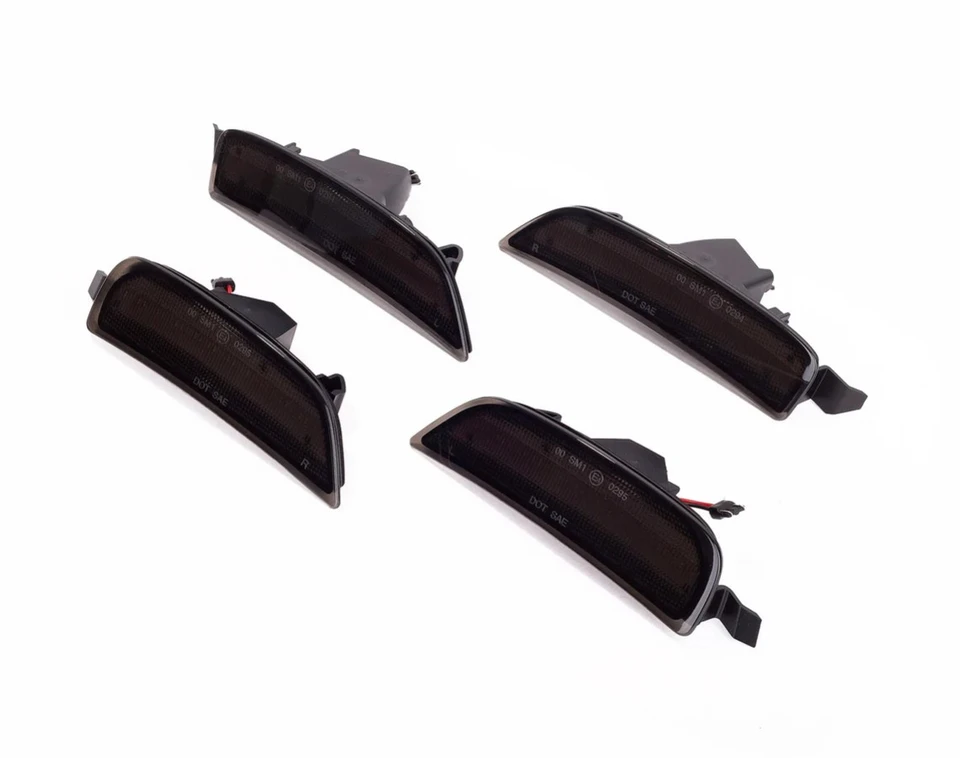 Product photo of four smoked side marker lights for a Mazda MX-5. The kit includes two front markers with amber LED strips and two rear markers with red LED strips. Each unit features a sleek, dark-tinted lens and a plug-and-play wiring connector
