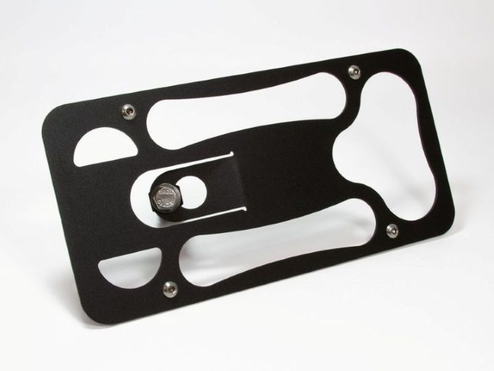 Close-up of the rugged, black powder-coated Platypus license plate bracket showing precision machining and durable construction