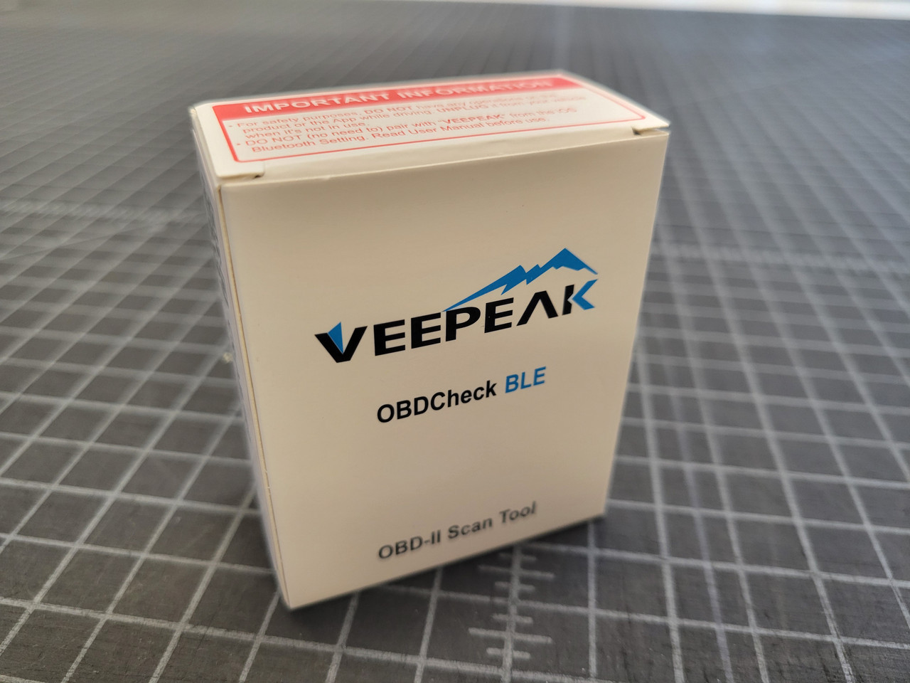 VeePeak Bluetooth OBDII Diagnostic Tool in the box standing