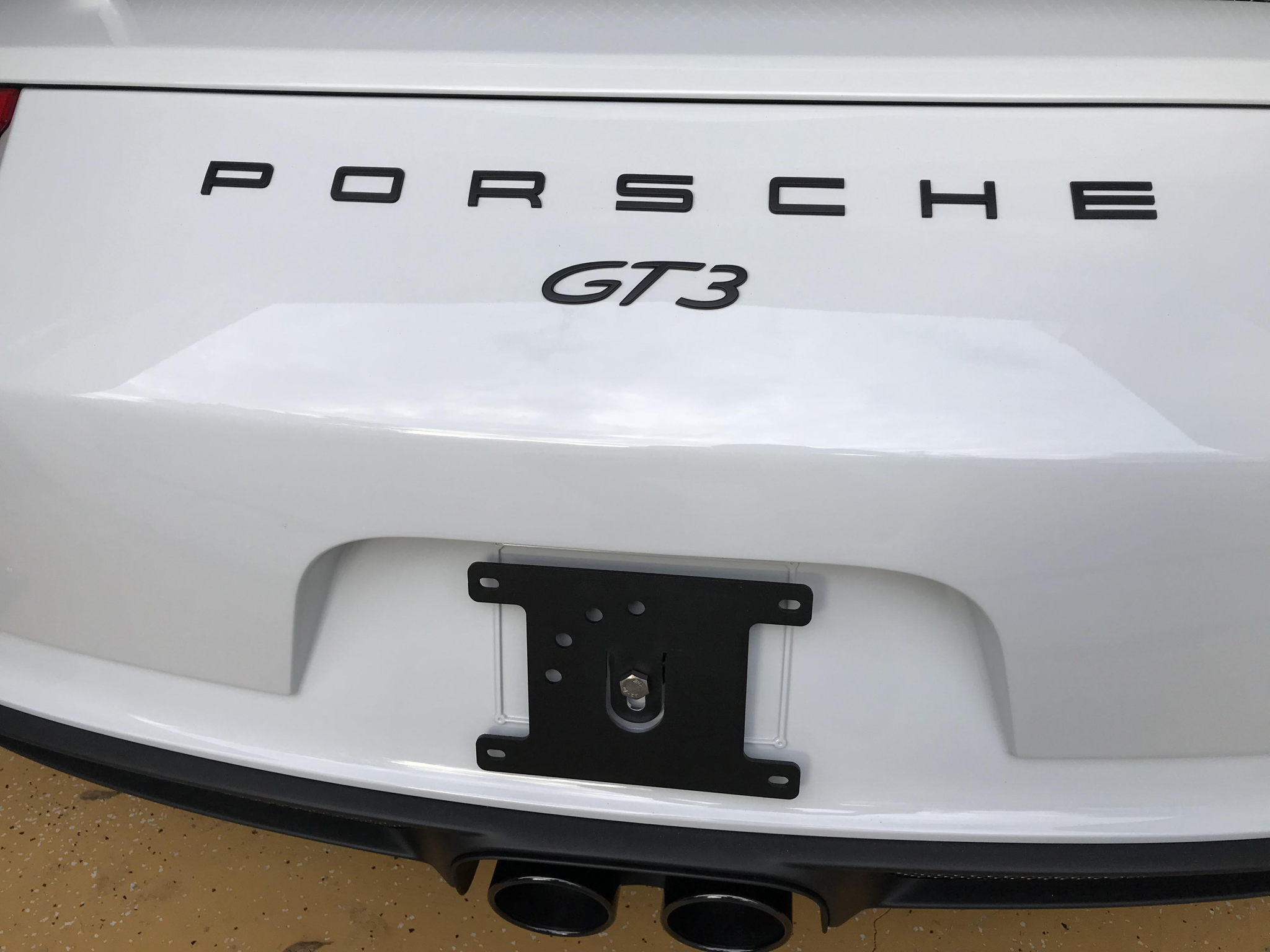 https://cdn11.bigcommerce.com/s-351ed/images/stencil/{:size}/products/20620/167001/the_rear_platypus_license_plate_mount_for_porsche_911_991_B91ZC4Y_20620__52822.1684355423.jpg?c=2