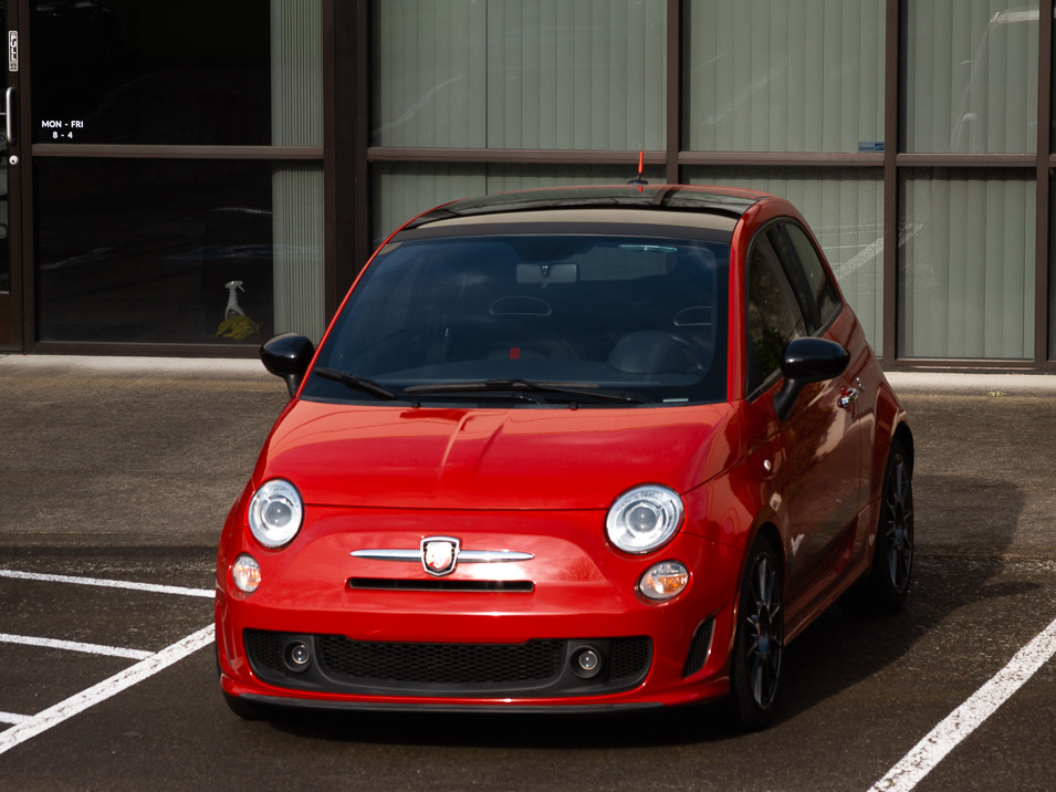 Red 500 Abarth with roof trim protector from CravenSpeed