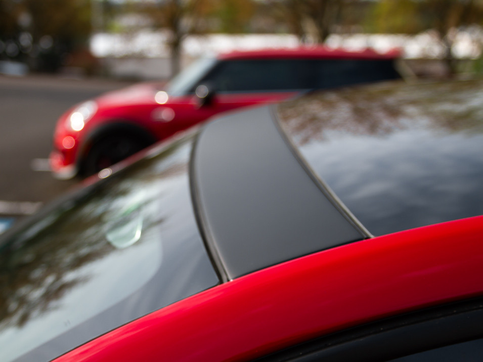 Matte black finish closeup of roof trim protector from CravenSpeed