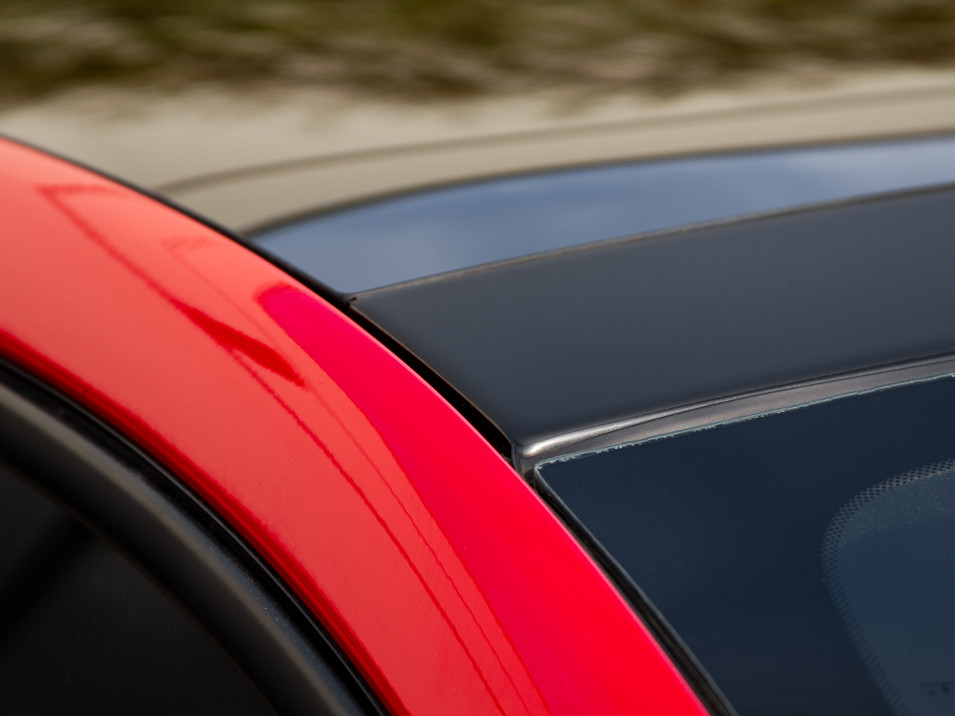 A Fiat 500 Abarth with the CravenSpeed roof trim protector installed.