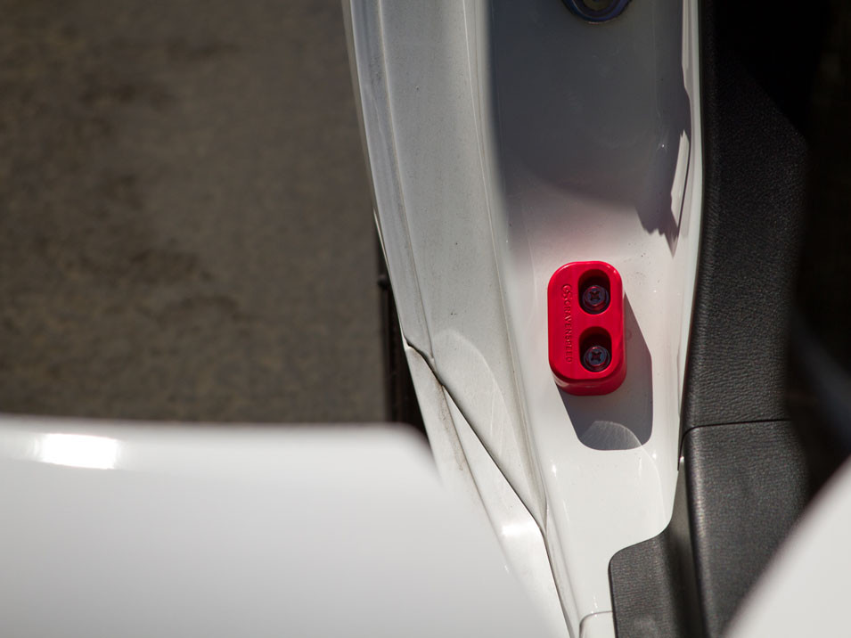 Red CravenSpeed Door Bushins installed in a 2016 Mazda MX-5 Miata ND.