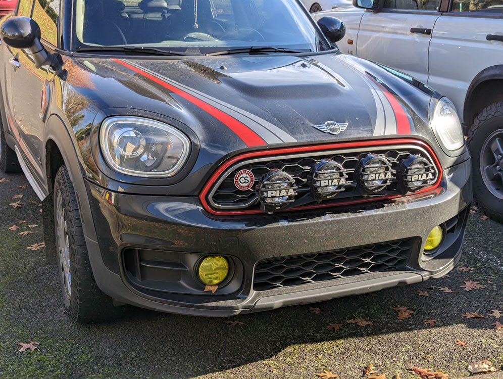 The Grille Badge Holder with a Union Jack badge installed on a MINI Countryman F60.