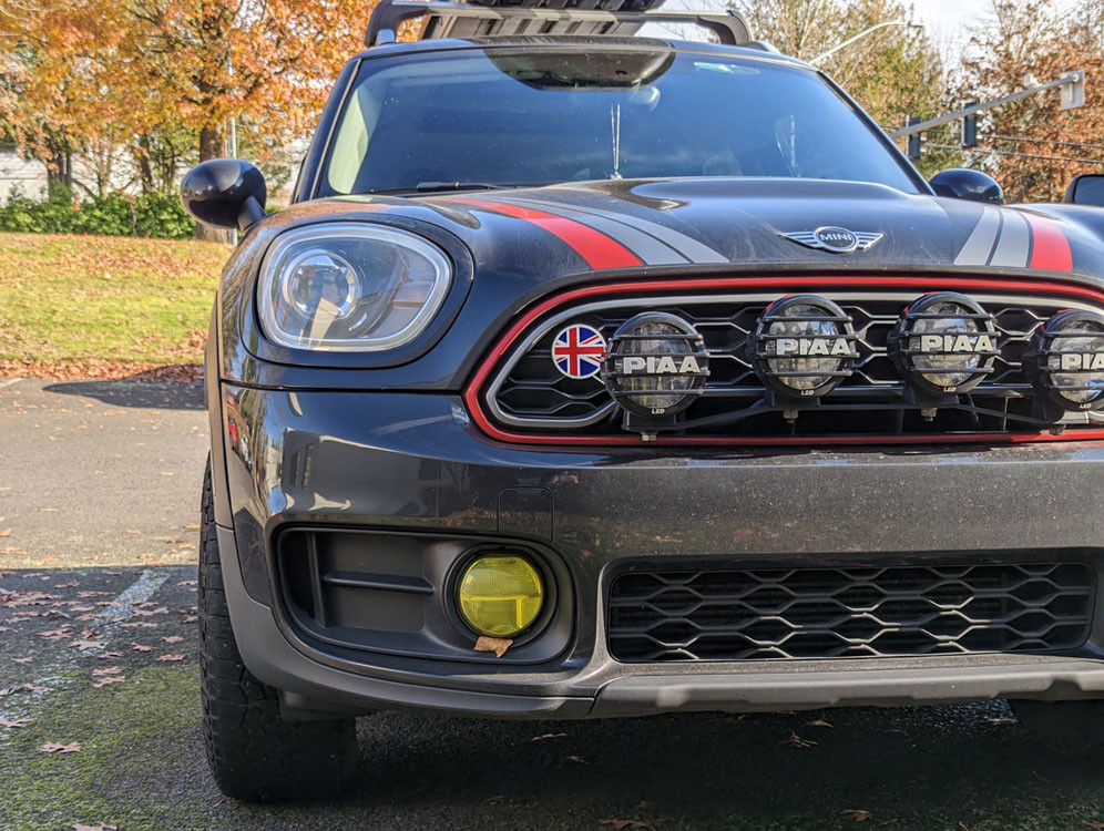 The Grille Badge Holder with a Union Jack badge installed on a MINI Countryman F60.