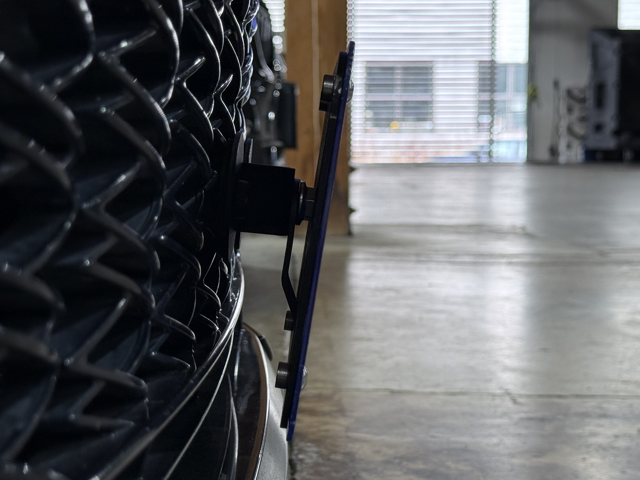 Due to the shape & styling of the Lexus IS grille, the Platypus will be slightly angled downward if installed in the same location as in the pictures. 