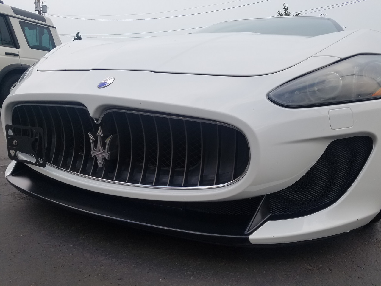 https://cdn11.bigcommerce.com/s-351ed/images/stencil/{:size}/products/24188/223769/the_platypus_license_plate_mount_for_maserati_granturismo_convertible_2010_to_2019_XHPP5CA_24188__78994.1702431208.jpg?c=2
