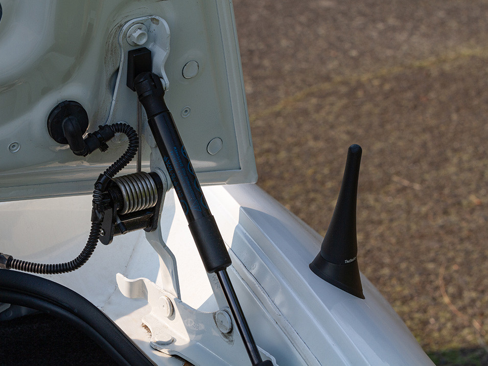 The right trunk popper mechanism and the CravenSpeed Stubby Antenna.